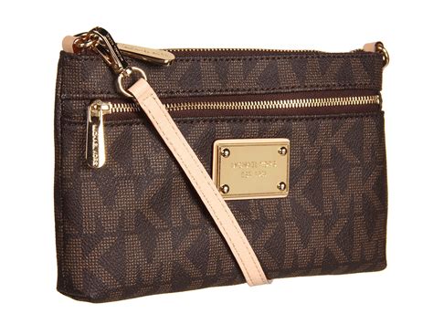 michael kors monogram wristlet|michael kors clutch handbags.